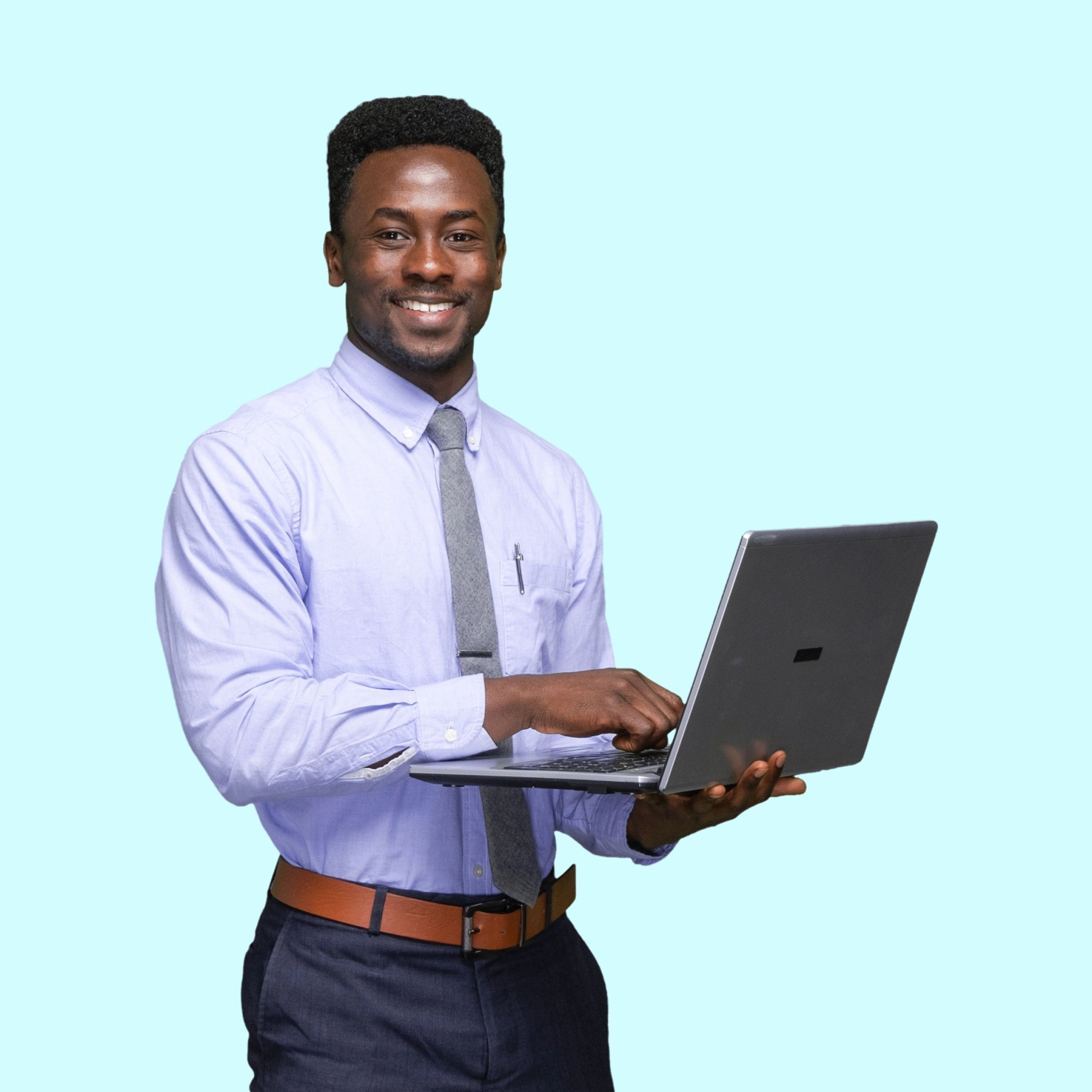 Cybersecurity professional working on a laptop