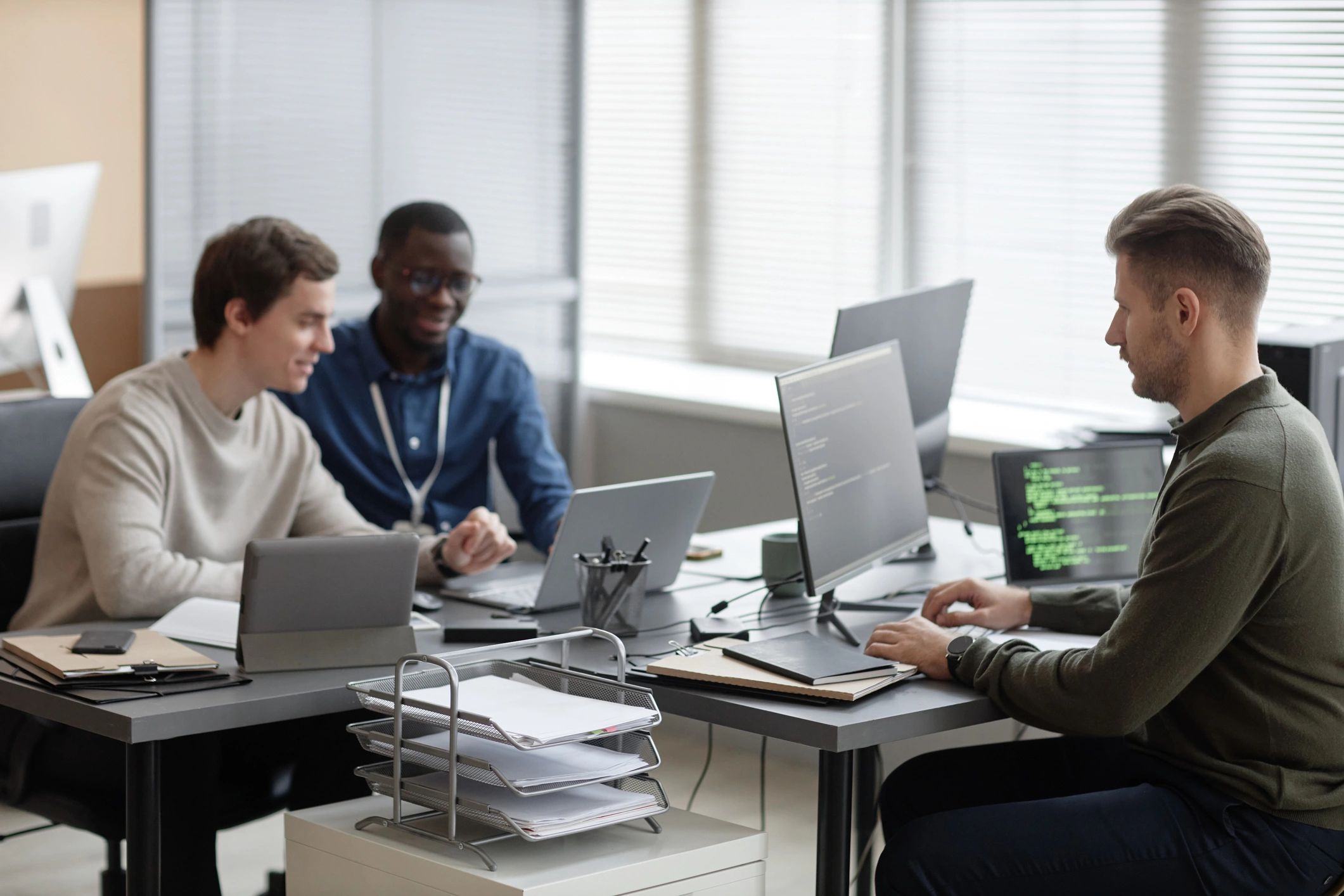 Security operations team working at desks
