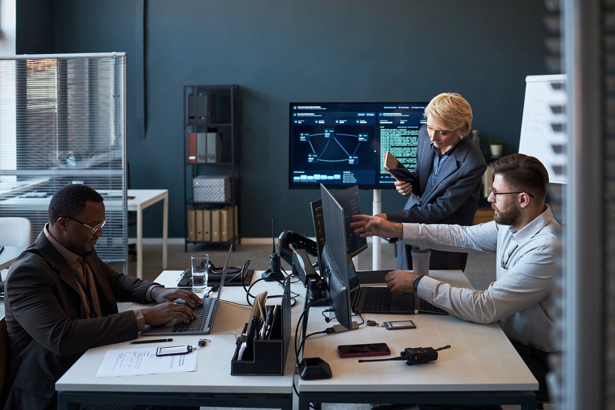 Security operations team monitoring threat dashboards